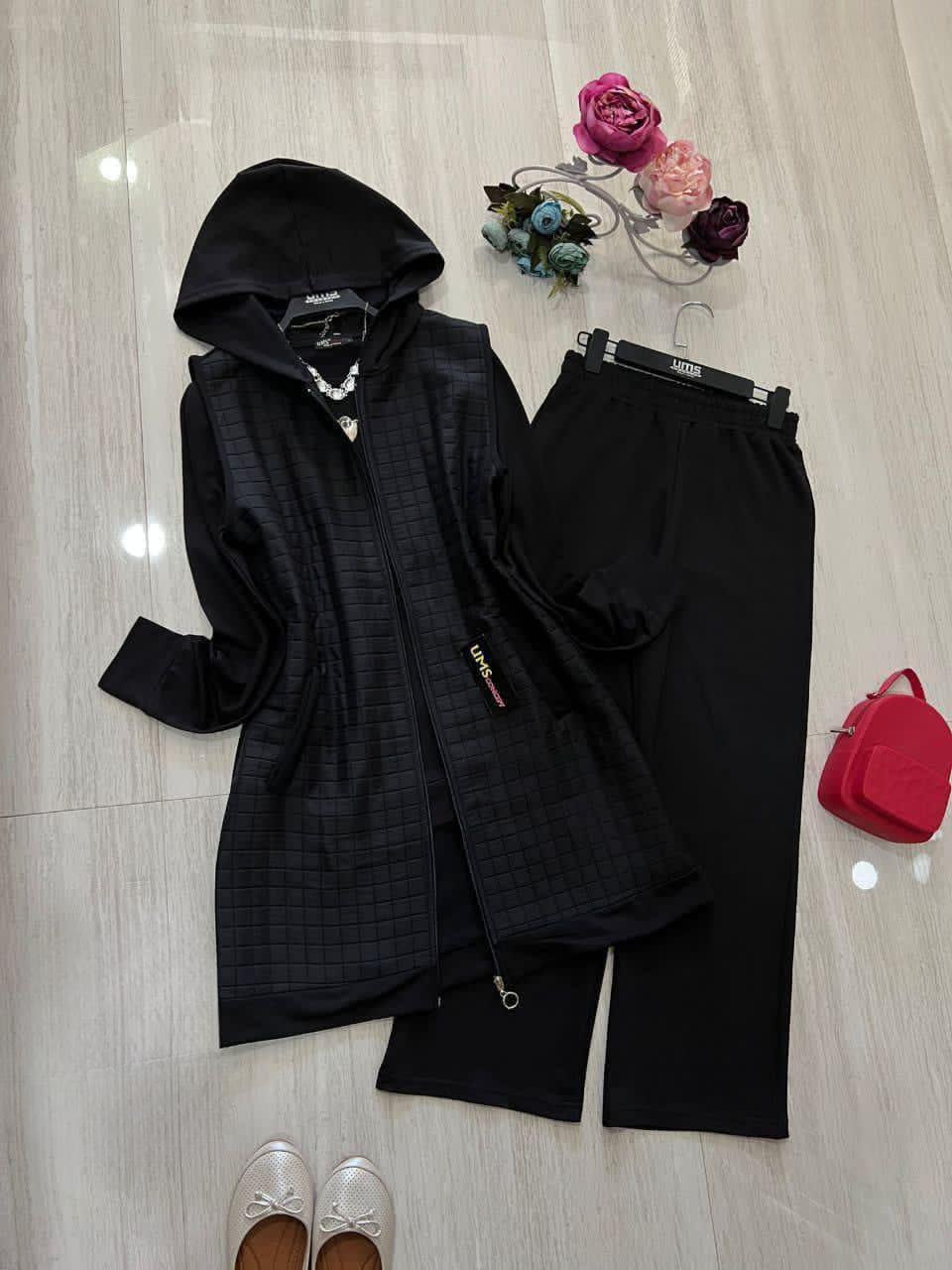 طقم من قطعتين باللون الأسود (هودي وسروال)